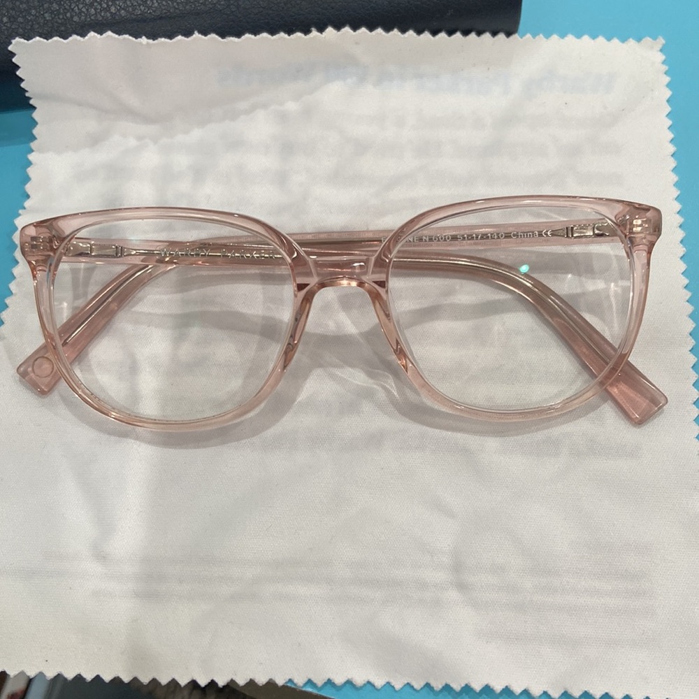 Warby Parker light pink frames glasses